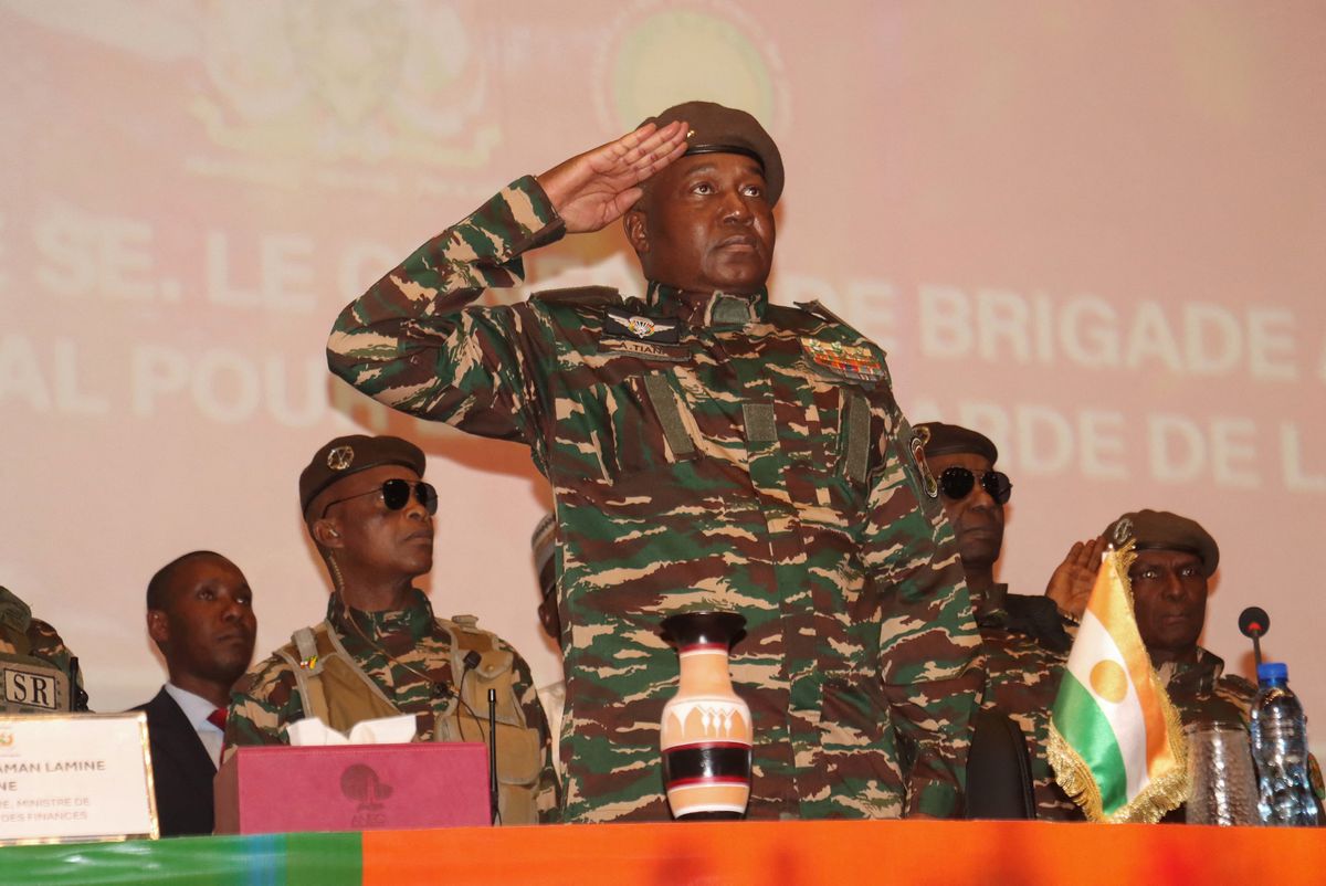 The head of Niger's military regime, General Abdourahamane Tiani (C) attends the opening of the commission responsible for conducting the national conference in Niamey on February 15, 2025. The head of Niger's military regime, General Abdourahamane Tiani, launched five days of "national conferences" in Niamey on February 15, 2025, which are supposed to set the duration of the transition, which has been underway since a coup d'état in July 2023. (Photo by AFP)