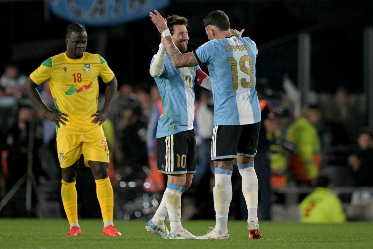 Argentina's defender #19 Nicolas Otamendi greets Argentina's forward #10 Lionel Messi before being substituted during the international friendly football match between Argentina and Benin at the Mas Monumental stadium in Buenos Aires on October 6, 2026. (Photo by JUAN MABROMATA / AFP)