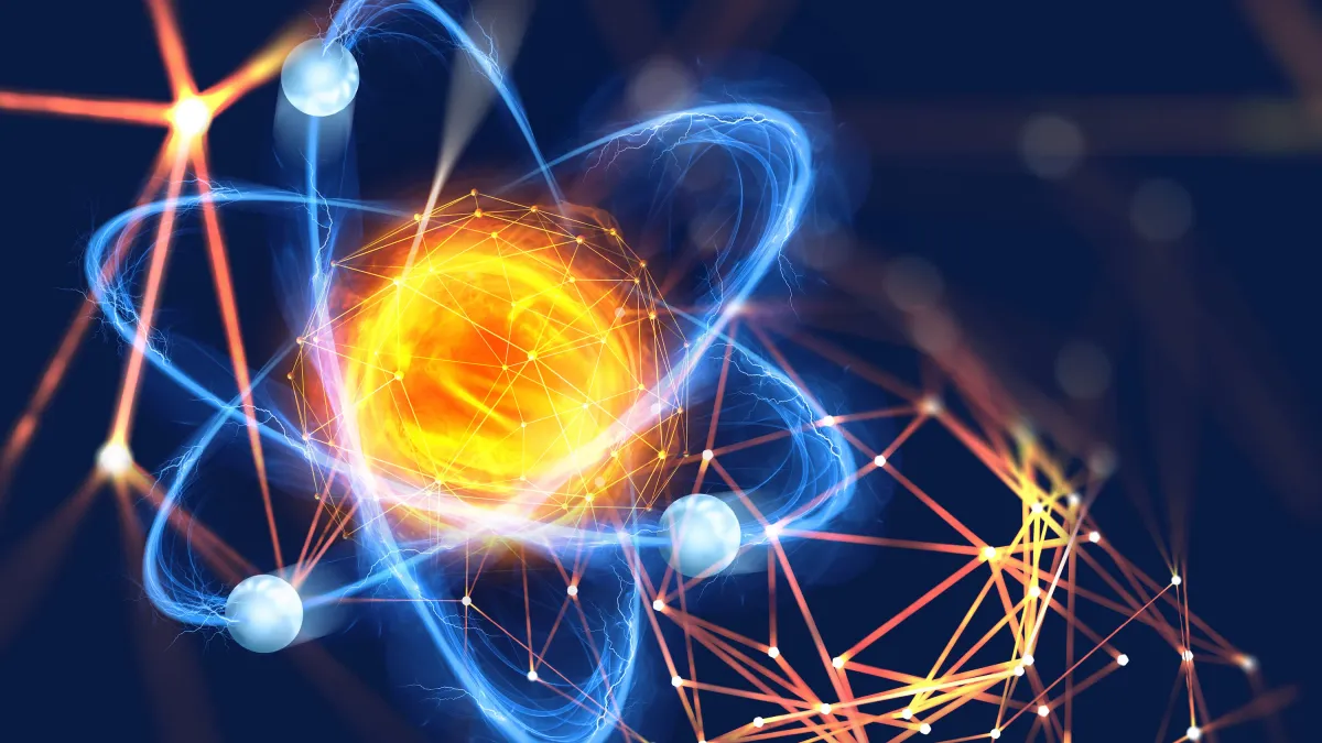 Atomic structure. Futuristic concept on the topic of nanotechnology in science. The nucleus of an atom surrounded by electrons on a technological background