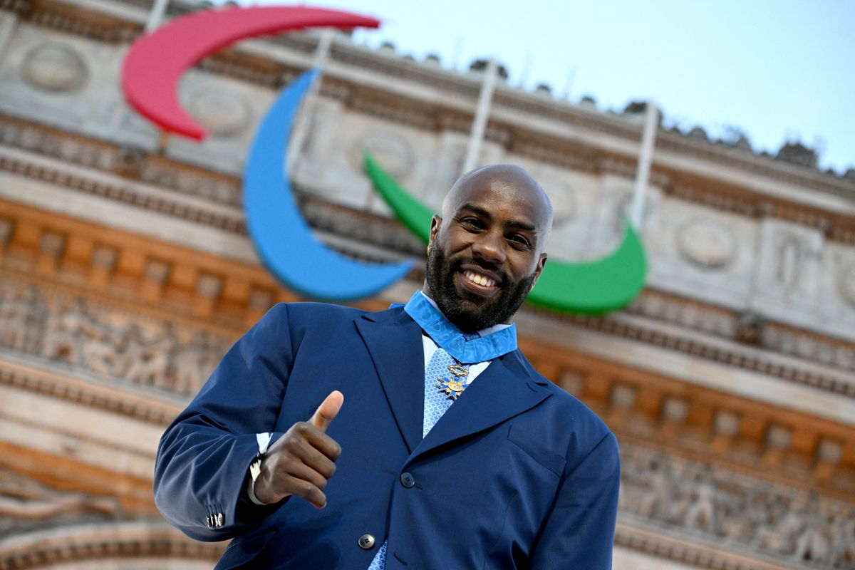 Teddy Riner (FRA Judo) is awarded during the Champions Parade following the Paris 2024 Games, at Champ-Elysees, in Paris, France, on September 14, 2024, Photo Lionel Hahn / KMSP (Photo by HAHN Lionel / KMSP via AFP)