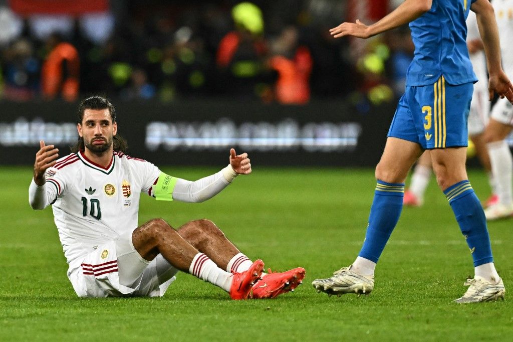 Hungary's midfielder #10 Dominik Szoboszlai (L) reacts during the UEFA Nations League Group B2 football match between Ukraine and Hungary in Trnava, Slovakia on October 5, 2026. (Photo by Joe Klamar / AFP)