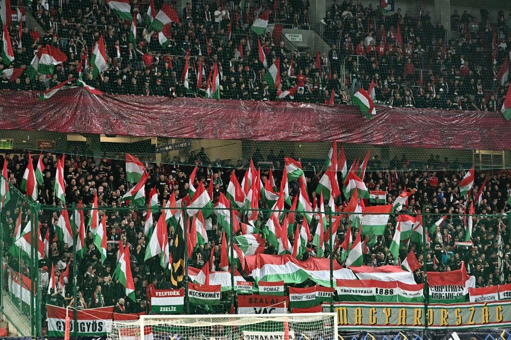 Hungary fans cheer for their team prior to the UEFA Nations League Group B2 football match between Ukraine and Hungary in Trnava, Slovakia on October 5, 2026. (Photo by Joe Klamar / AFP)