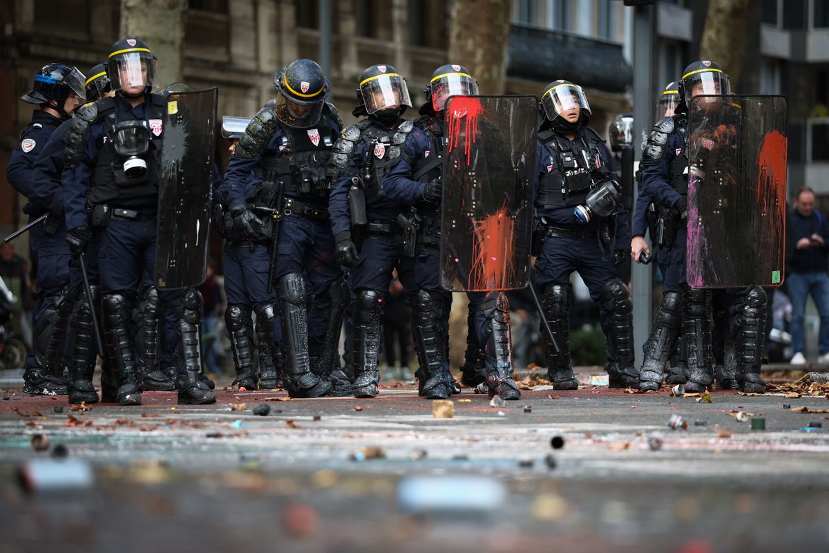 French Republican Security Corps (CRS - Compagnies Republicaines de Securite) stand guard during a demonstration to protest against the "high cost of living", in Lille, northern France, on October 17, 2026 as part of a nationwide call for mobilisation bringing together various groups expressing their anger: former "Yellow Vests", secondary school and university students, climate activists and even farmers. After weeks of student protests, France faces broader, nationwide demonstrations on October 17, 2026 over the cost of living, setting up a potentially fraught six months heading into a presidential election. A police source told AFP that authorities estimated nearly 200,000 people could take part, with 40,000 in Paris. (Photo by Sameer AL-DOUMY / AFP)